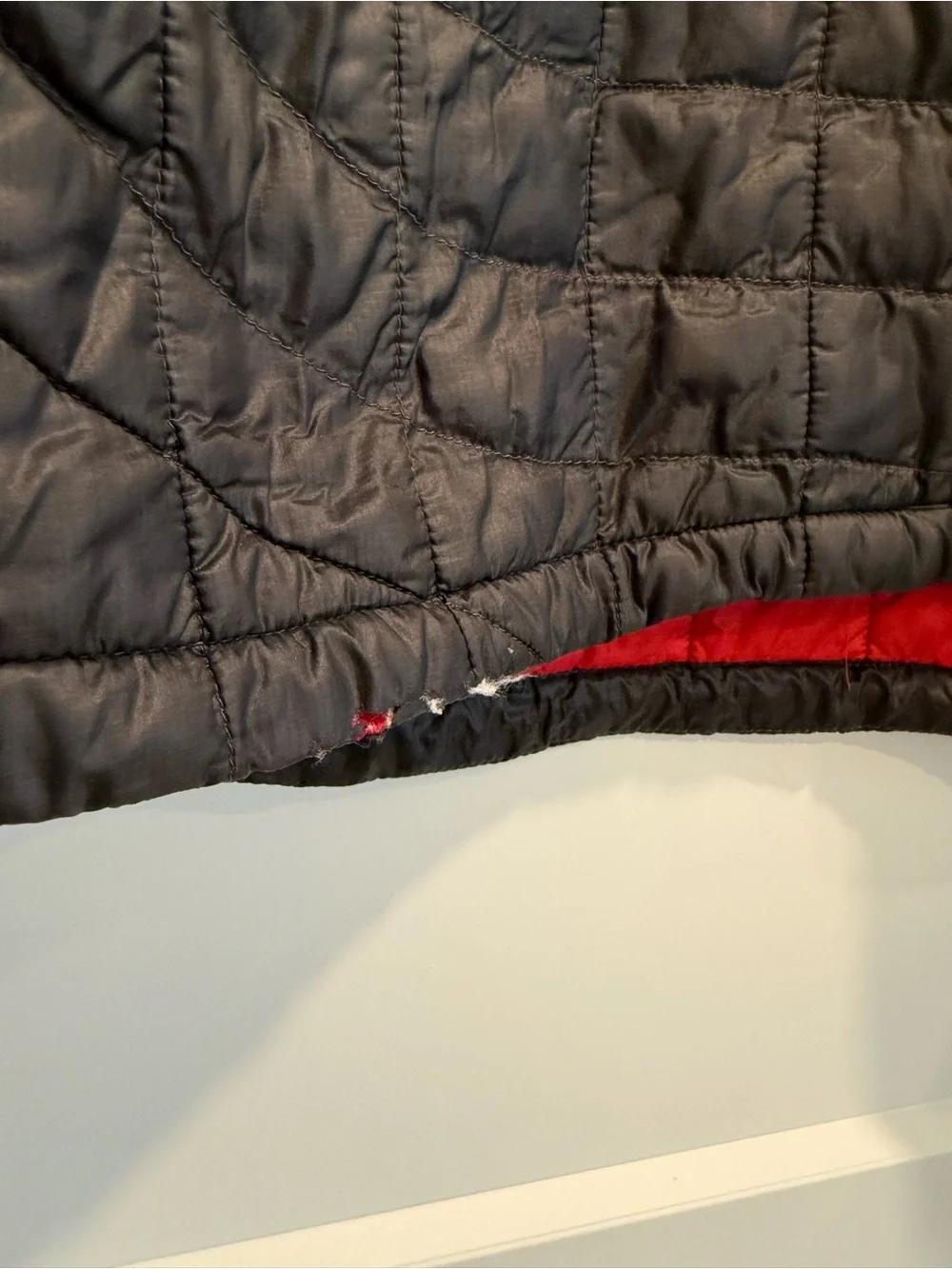 The North Face Men's Black ThermoBall Quilted Insulated Puffer with Red Accents